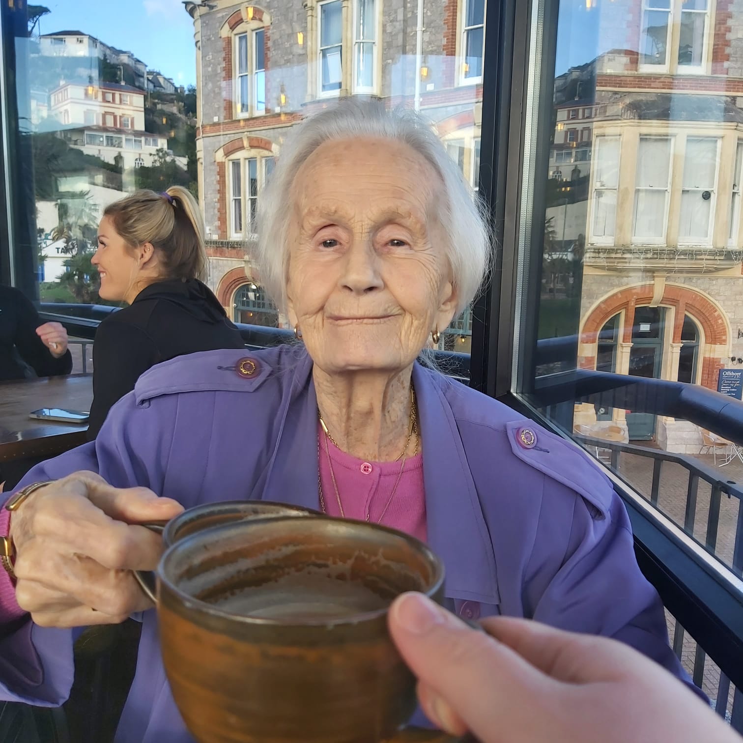 Client enjoying a drink at the harbour