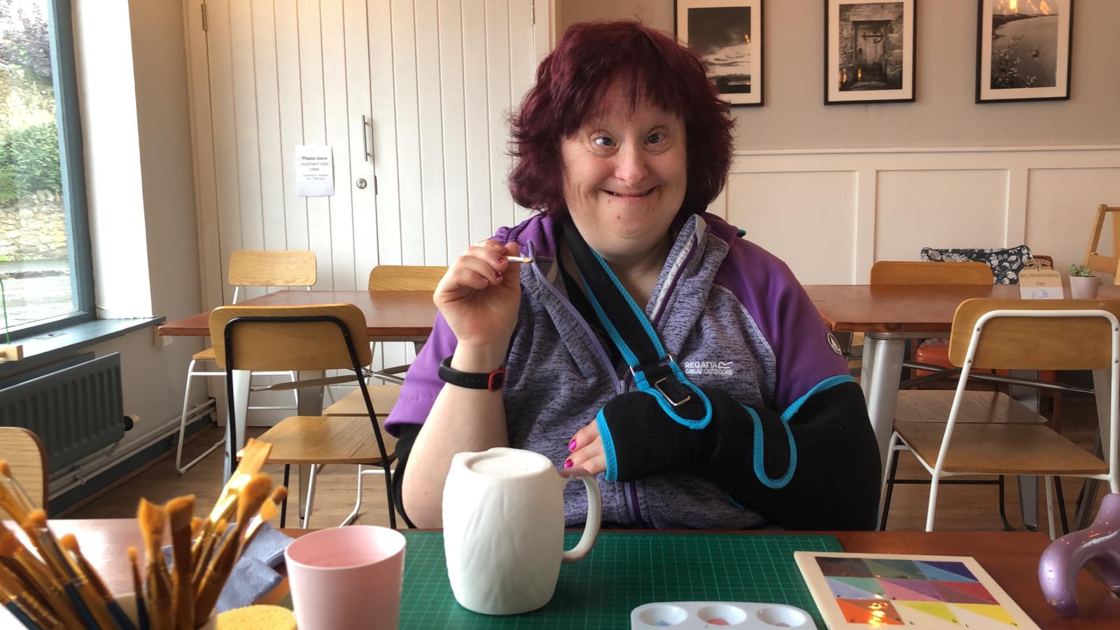 Client enjoying pottery activities