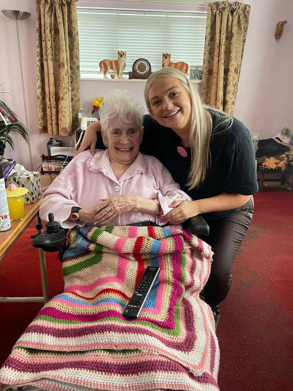 Client with their carer at home