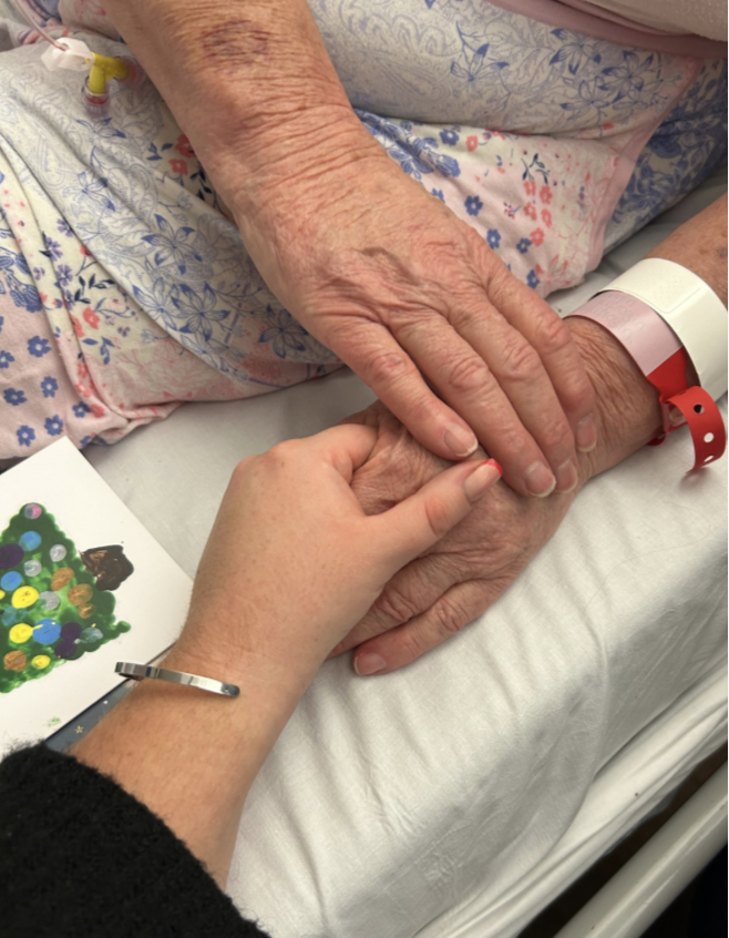 Hands showing compassionate care